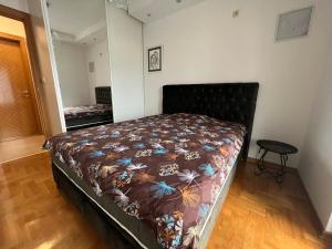 Postel nebo postele na pokoji v ubytování Apartment with Seaview Zetagradnja
