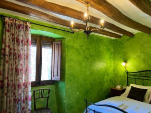 Posteľ alebo postele v izbe v ubytovaní Can Met Mosso, Casa rural con Piscina Climatizada