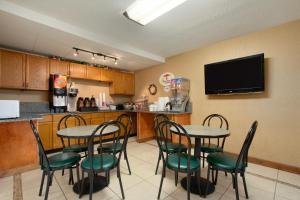 A restaurant or other place to eat at Super 8 by Wyndham Homewood Birmingham Area