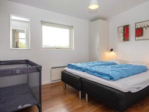 Postel nebo postele na pokoji v ubytování Holiday home Haderslev L