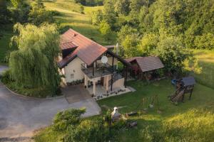 an aerial view of a house with a playground at Apartment Mia in Slunj