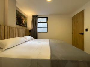 Postel nebo postele na pokoji v ubytování Vita Hotel Boutique