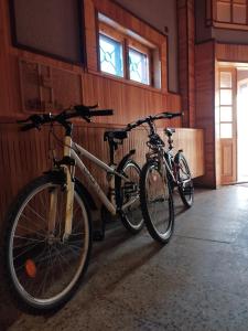 two bikes parked next to each other in a building at EXCLUSIVE HOUSE 400m2 - Sauna, BBQ, fireplace in Narva