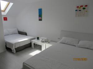 Postel nebo postele na pokoji v ubytování Dă-i pace mai + 35 fotografií