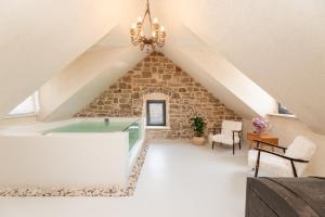 a room with a glass pool in the attic at She House - built for pleasure - Island of Brač in Gornji Humac