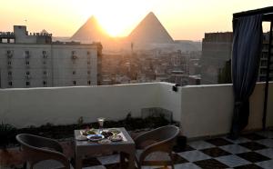 Balkón nebo terasa v ubytování Jessy Pyramids View Inn