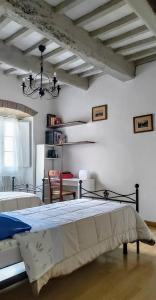 Posteľ alebo postele v izbe v ubytovaní Il Castello