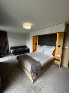 Un pat sau paturi într-o cameră la Sea Resort