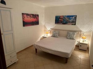 Postel nebo postele na pokoji v ubytování LIGHTBLUE-CELESTE Central Apartment in Porto Rotondo + 14 fotografií