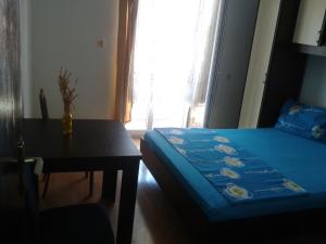 Postel nebo postele na pokoji v ubytování Apartments Alissa