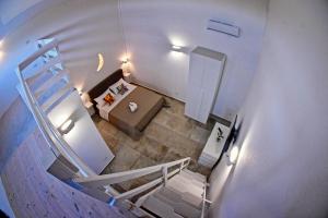 an overhead view of a staircase in a house at Tenuta Corano Nardò in Nardò