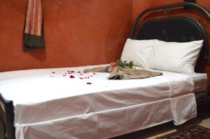 Letto o letti in una camera di Riad Wink