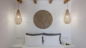 Ένα ή περισσότερα κρεβάτια σε δωμάτιο στο Elements of Milos
