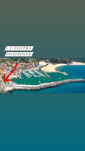 an aerial view of a harbor with boats in the water at Dal Torrese in Marina di Camerota