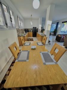 A television and/or entertainment centre at Luxor Rose Villa