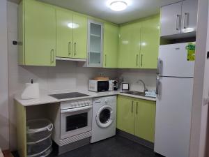 Η κουζίνα ή μικρή κουζίνα στο Apartamento Estrella de Teruel +35 φωτογραφίες