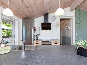 a kitchen with a sink and a counter top at 7 person holiday home in Højslev-By Traum in Højslev