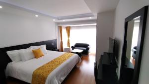 Μια τηλεόραση ή/και κέντρο ψυχαγωγίας στο Hotel Palermo Suite