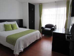 Ένα ή περισσότερα κρεβάτια σε δωμάτιο στο Hotel Palermo Suite