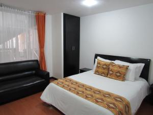 Ένα ή περισσότερα κρεβάτια σε δωμάτιο στο Hotel Palermo Suite
