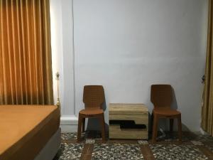 Posezení v ubytování Bello Ethnic Bungalow & Resto