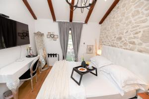 Postel nebo postele na pokoji v ubytování Casa di Nikola