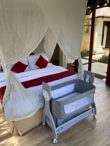 Кровать или кровати в номере Jimbaran BeachStroll Villa (2BR)