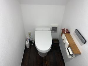a bathroom with a white toilet in a room at Shinjuku Miyabi Residence - Vacation STAY 94520 in Tokyo