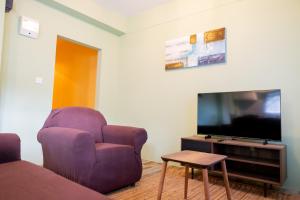 Televisor o centre d'entreteniment de Golden Palms Apartment
