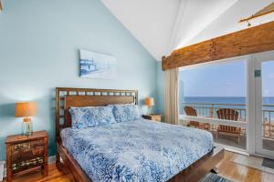 Ένα ή περισσότερα κρεβάτια σε δωμάτιο στο White Sands 459