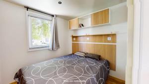 Posteľ alebo postele v izbe v ubytovaní Camping Officiel Siblu Les Oyats