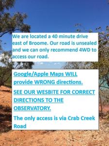 a screenshot of a sign for a road with a tree at Broome Bird Observatory in Broome