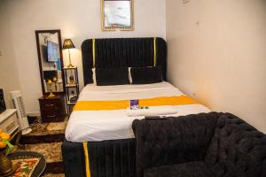 Voodi või voodid majutusasutuse Budget friendly studio in Naka-Nakuru toas