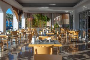 Restoranas ar kita vieta pavalgyti apgyvendinimo įstaigoje Kolymbia Bay Art Boutique Hotel - Adults Only