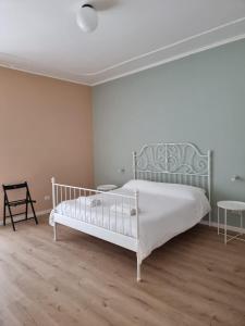 Rúm í herbergi á Three Rooms Alghero