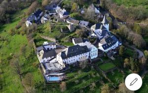an aerial view of a large estate with a house at Fewo Eifel Dahlem Nationalpark Sonnenterrasse & Kamin in Dahlem