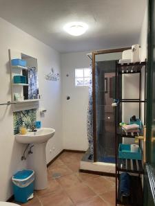 a bathroom with a shower and a sink at La Puerta del Sol in Adeje +57 photos