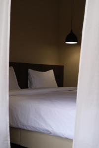 Voodi või voodid majutusasutuse Suncloud Hotel Koh Samet toas