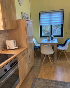 Cuina o zona de cuina de Klimatisierte Familienchalets am Millstätter See