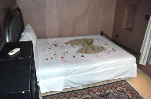 Letto o letti in una camera di Riad Wink