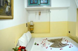 Letto o letti in una camera di Riad Wink
