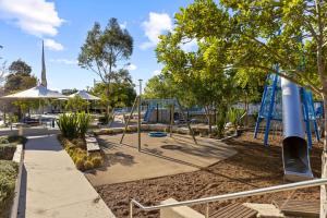 a park with a playground with a slide at Macquarie Park Executive 2 Bedroom in Sydney