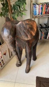 a statue of a dog standing on its hind legs at City Penthouse Kapstadt in Cape Town