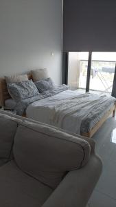 Säng eller sängar i ett rum på Sunrise Dubai