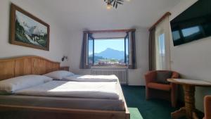 Postelja oz. postelje v sobi nastanitve Hotel Garni Zimmermann
