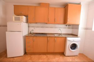 Kuchyň nebo kuchyňský kout v ubytování Top floor Torrevieja center apartment
