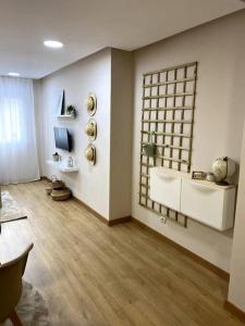 a living room with an asian themed room with at Apartamento Solpor in Vilagarcia de Arousa