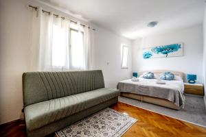 Postel nebo postele na pokoji v ubytování Amari-Zaton