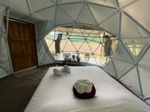 Ein Bett oder Betten in einem Zimmer der Unterkunft สะปันดีวิว Sapan Dee View บ่อเกลือ น่าน