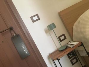 Postel nebo postele na pokoji v ubytování GAPO Rooms